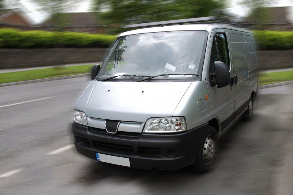 Am I entitled to worker's compensation if injured while riding in a van for temporary work?